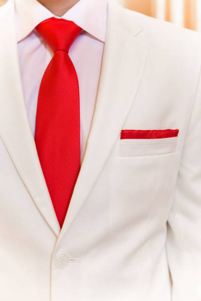 istock White suit with a red tie and a scarf 638461456
