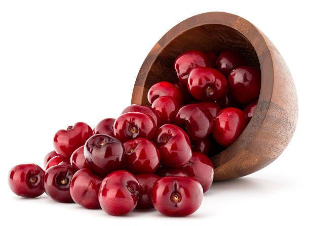 istock cherry berries in wooden bowl 638461738