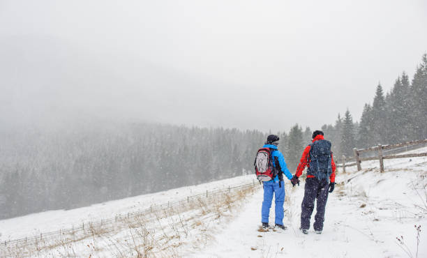 istock Couple hiking in the Carpathian mountain 638462492