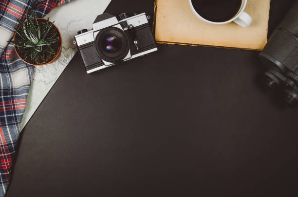 istock Travel accessories top view black chalkboard background with copy space 638462680