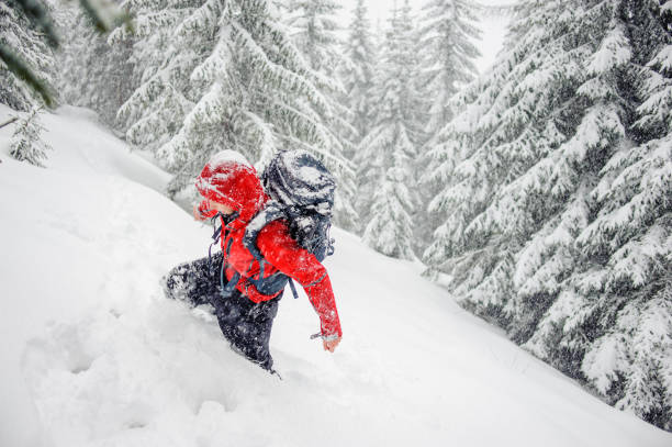 istock tourist guy stuck in snow drifts 638462732