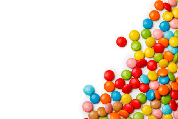 istock colorful chocolate buttons on white background 638463170