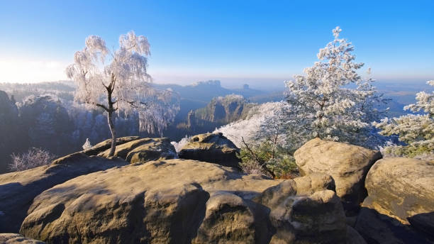 Elbe sandstone mountains in winter and hoarfrost, Carolarock