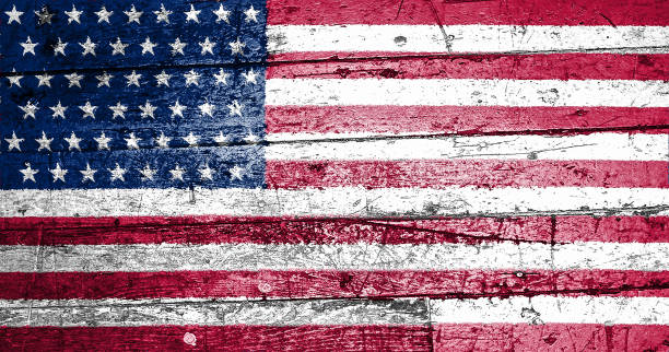 istock American flag painted on old wooden planks. 638466178