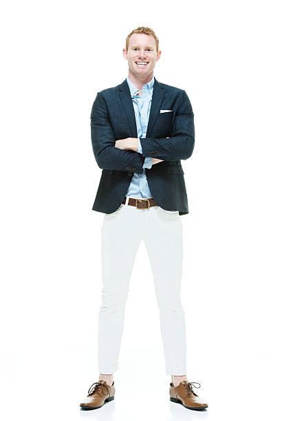 istock Smiling man standing with arms crossed 638466962