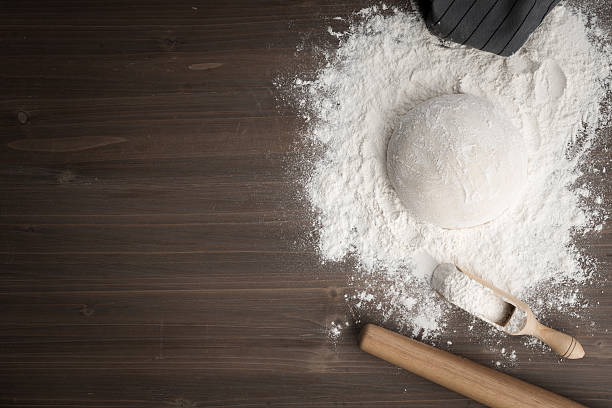 making dough over wooden table - gourmet pastry bread horizontal imagens e fotografias de stock