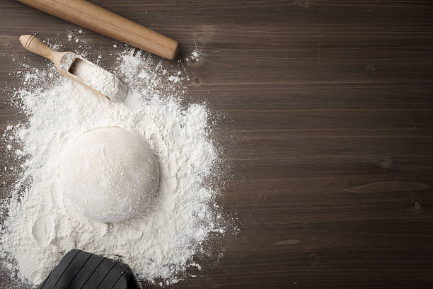 making dough over wooden table - gourmet pastry bread horizontal imagens e fotografias de stock