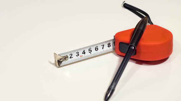 istock Tape-measure and the ballpoint black pen 638469410