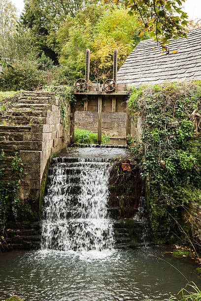 Water Mill Sluce Gate Water Mill Sluce Gate burton sussex stock pictures, royalty-free photos & images
