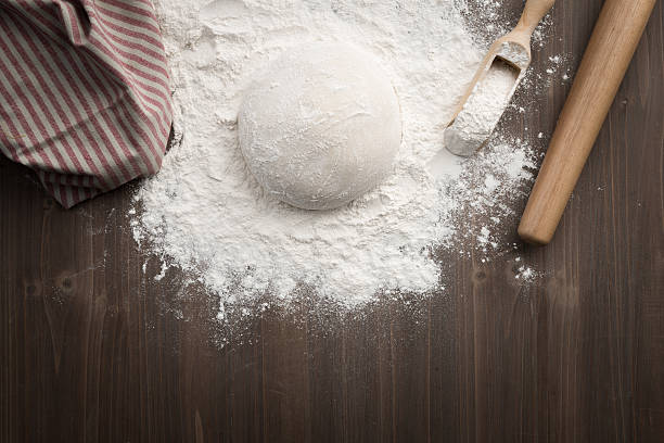 making dough over wooden table - gourmet pastry bread horizontal imagens e fotografias de stock