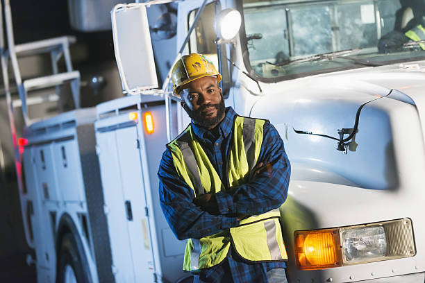 istock African American man with cherry picker truck 638471032