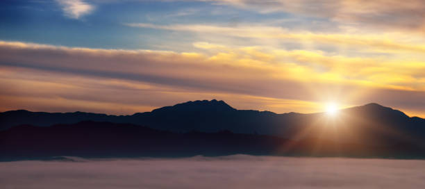 istock Bright sunrise, the mist in  mountain valley 638471516