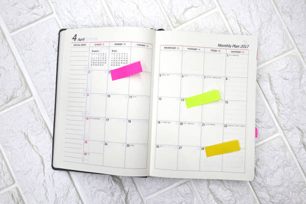 istock Diary with an appointment on April calendar 638472556