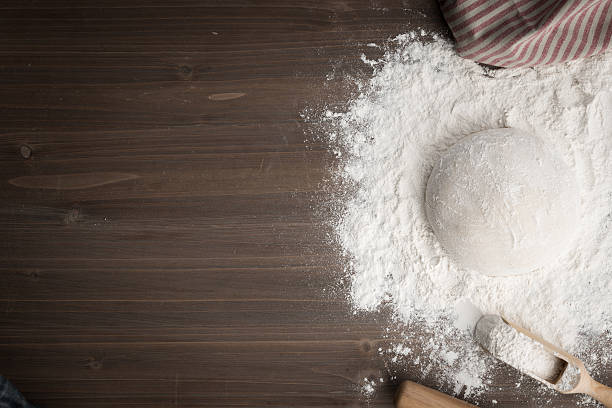 making dough over wooden table - gourmet pastry bread horizontal imagens e fotografias de stock