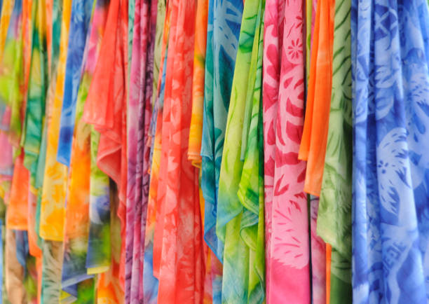 Colorful Pareos Tropical colored pareos ready for sale, French Polynesia sarong stock pictures, royalty-free photos & images