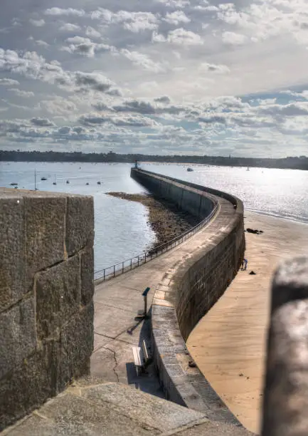 Photo of Long stone road to lighthouse in Saint-Malo, France