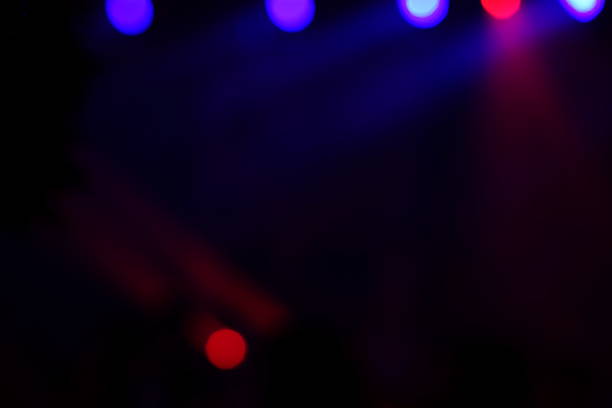 istock Defocused entertainment concert lighting on stage 638476356
