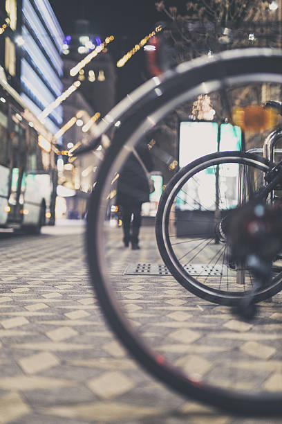 istock Bicycles in the city at night 638479734