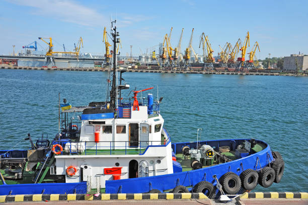 istock Tugboat in harbor quayside 638480404