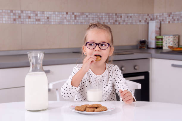 istock Toddler girl having breakfast 638480904