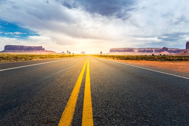 istock Monument valley road going to the horizon 638482028
