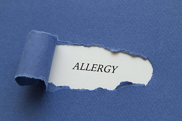istock Allergy word written under torn paper. 638482238