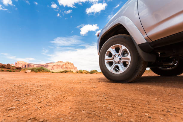 istock Truck in desert with mountains on the background. 638482556