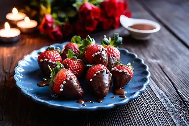 Delicious chocolate covered strawberries, decorated with silver sprinkles for Valentine's Day