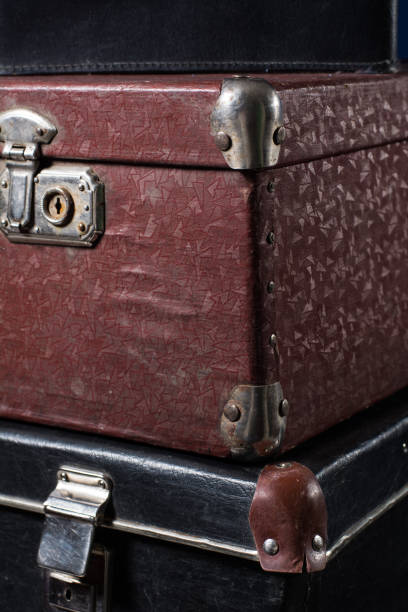 istock Close-up of a stack vintage shabby suitcases 638485676