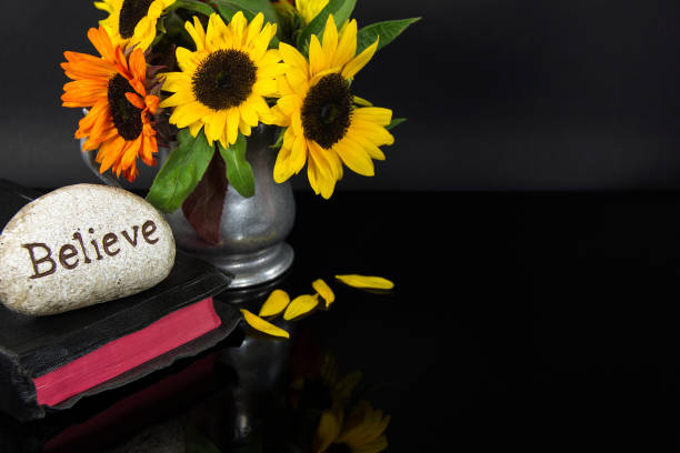 istock believe carved in stone on Bible 638487600