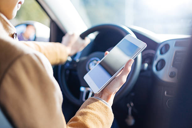 istock young asian man  hold tablet in car 638488028