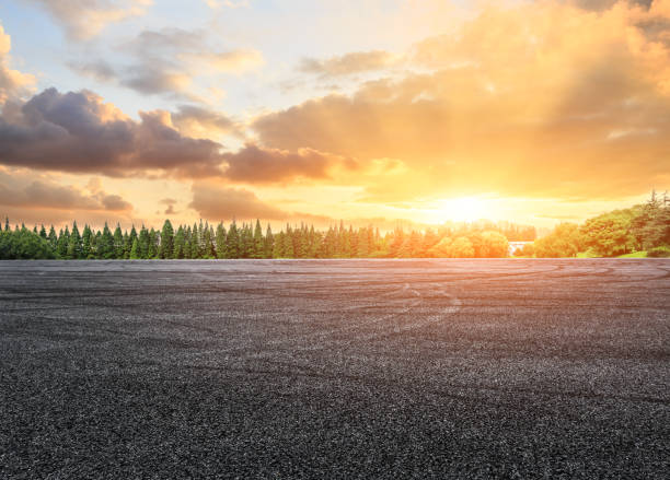 istock rural asphalt road scenery at sunset 638490054