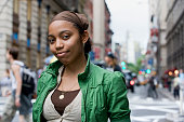 Portrait of young Hispanic woman in downtown city