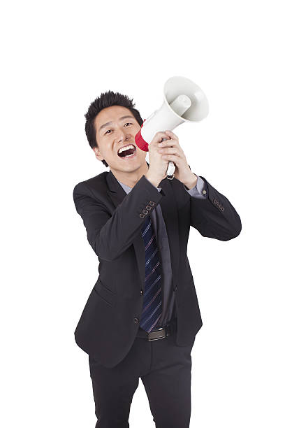 istock Young Businessman Holding Megaphone 638491294