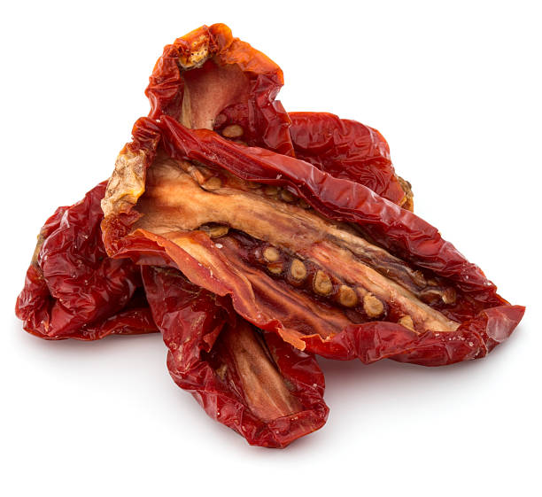 istock Dried tomatoes isolated on white background cutout 638491540