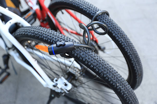istock two bikes locked together in city 638492978