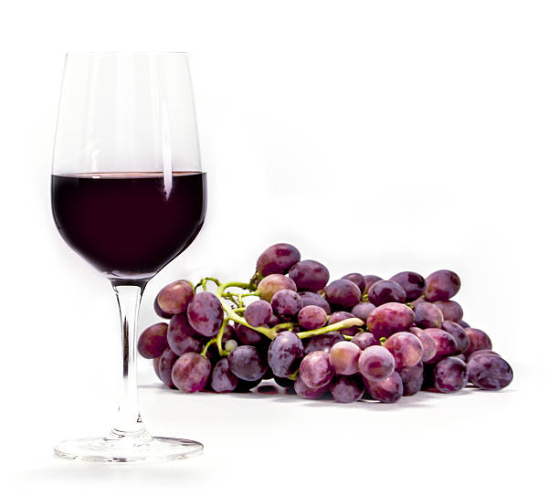 istock Glass of red wine with grapes 638495146