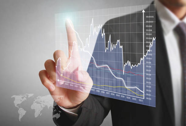 istock Businessman with financial symbols coming 638496042