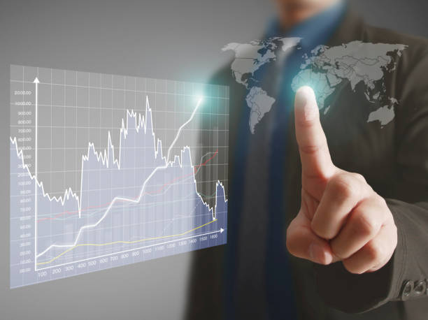 istock Businessman with financial symbols coming 638496204