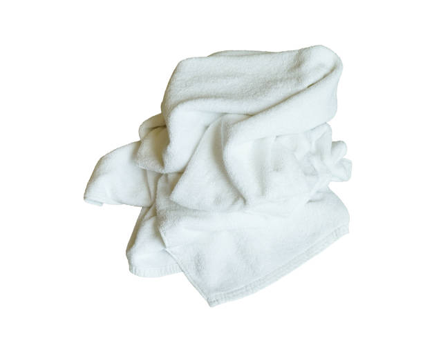 istock Stacked white spa cloth beach towels isolated on white background. 638497564