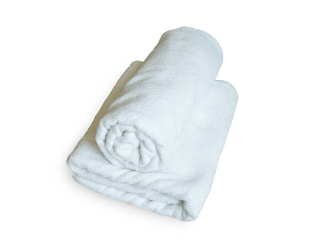 istock Stacked white spa cloth beach towels isolated on white background. 638497650