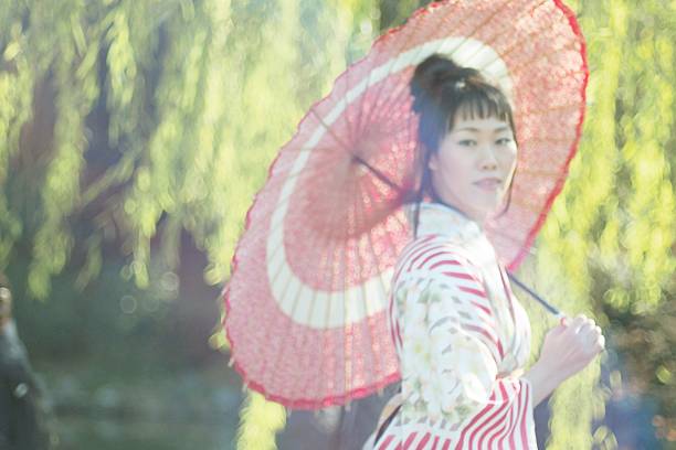 istock Woman in  kimono with umbrella 638500860