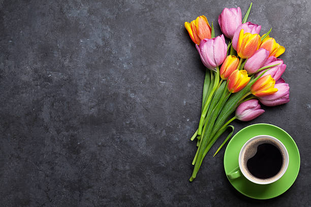 istock Fresh colorful tulip flowers and coffee 638501136