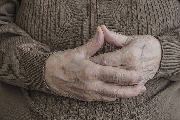 istock wrinkled hands of a senior person 638501552