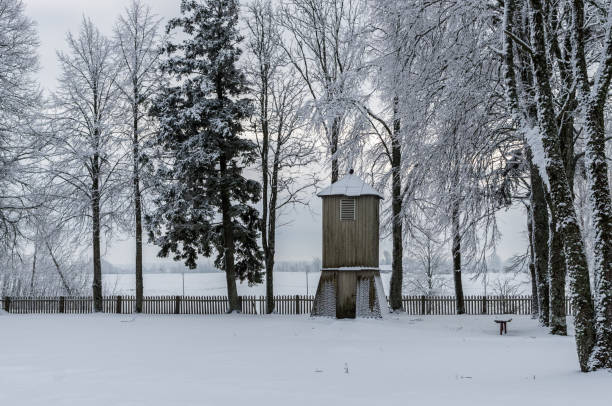 istock Old belfry in winter period. 638501768