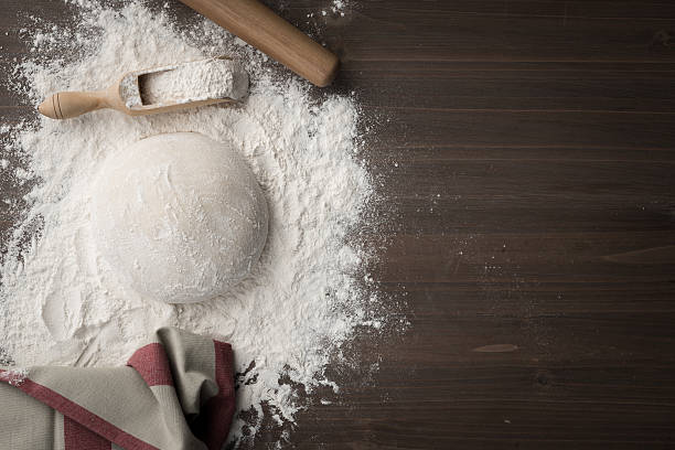 making dough over wooden table - gourmet pastry bread horizontal imagens e fotografias de stock