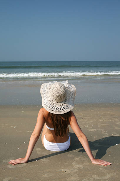 istock Woman on the beach 638502078