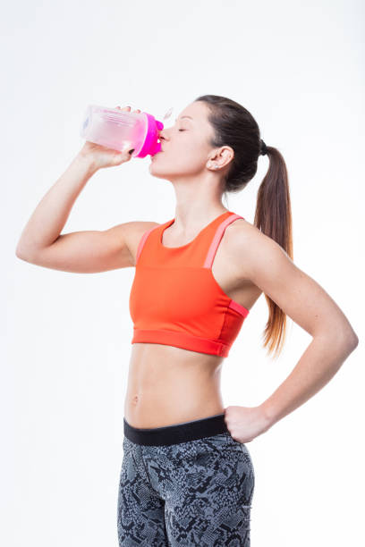 istock drinking and workout are healty lifestyle 638503316