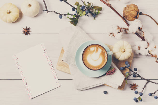 istock Pumpkin spice latte. Coffee top view on white wood background 638507038