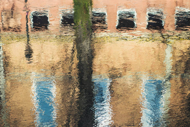 istock Beautiful city reflection in water 638507228